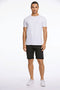 Front image of a model wearing the Superflex relaxed fit chino shorts in black, by brand Lindbergh