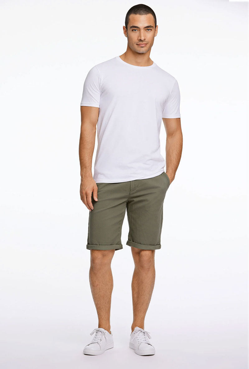 Front image of a model wearing Superflex relaxed fit chino shorts in khaki, by brand Lindbergh