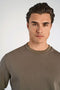 Front image of a model wearing the Lindbergh sweatshirt in brown, by brand Lindbergh