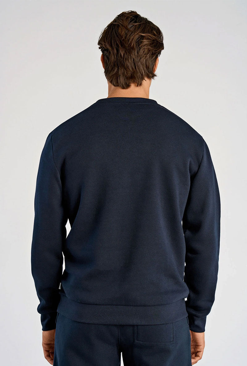Back image of a model wearing Lindbergh sweatshirt in navy, by brand Lindbergh