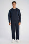Front image of a model wearing the Lindbergh sweatshirt in navy, by brand Lindbergh