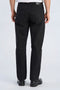 Back image of a model wearing the Loose fit jeans in black, by brand Lindbergh