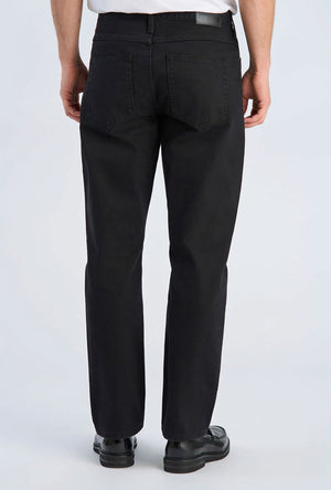 Back image of a model wearing the Loose fit jeans in black, by brand Lindbergh