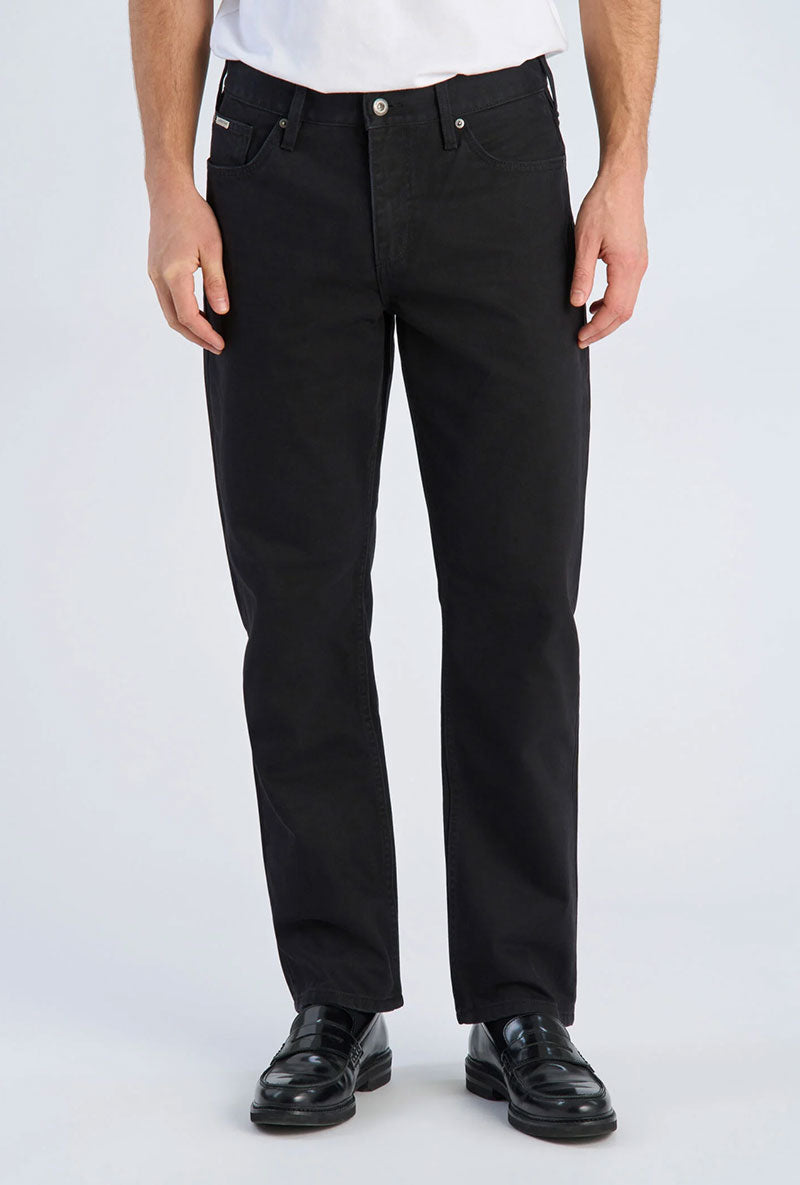 Front image of a model wearing Loose fit jeans in black, by brand Lindbergh
