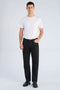 Front image of a model wearing the Loose fit jeans in black, by brand Lindbergh