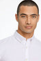 Front image of a model wearing the Oxford superflex ls shirt in white, by brand Lindbergh