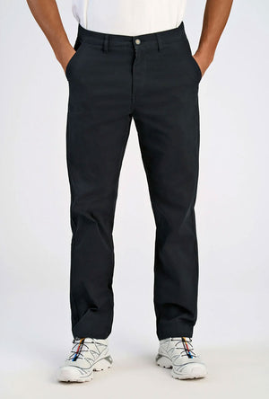 Front image of a model wearing the Superflex chino pants in black, by brand Lindbergh