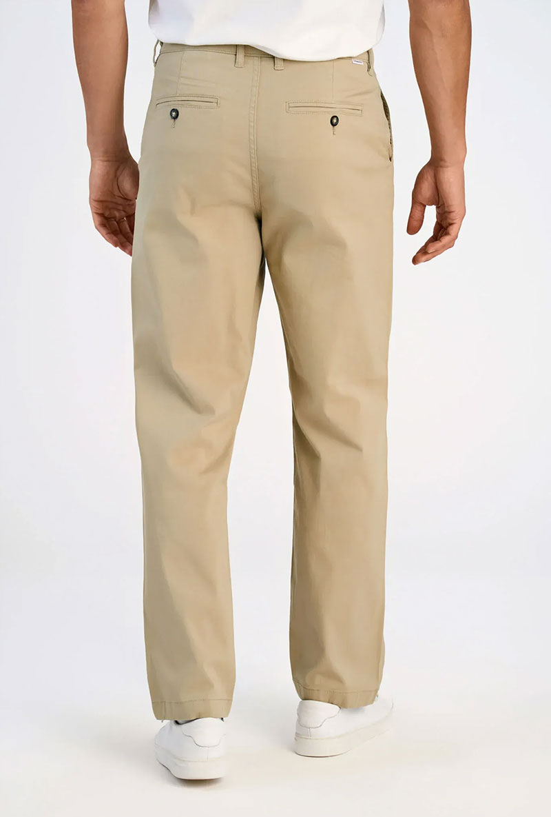 Back image of a model wearing Superflex chino pants in sand, by brand Lindbergh