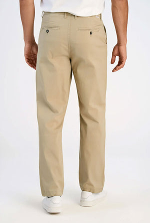 Back image of a model wearing the Superflex chino pants in sand, by brand Lindbergh