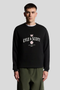 Front image of a model wearing the Lyle and scott cheers to tradition sweatshirt in black, by brand Lyle and scott