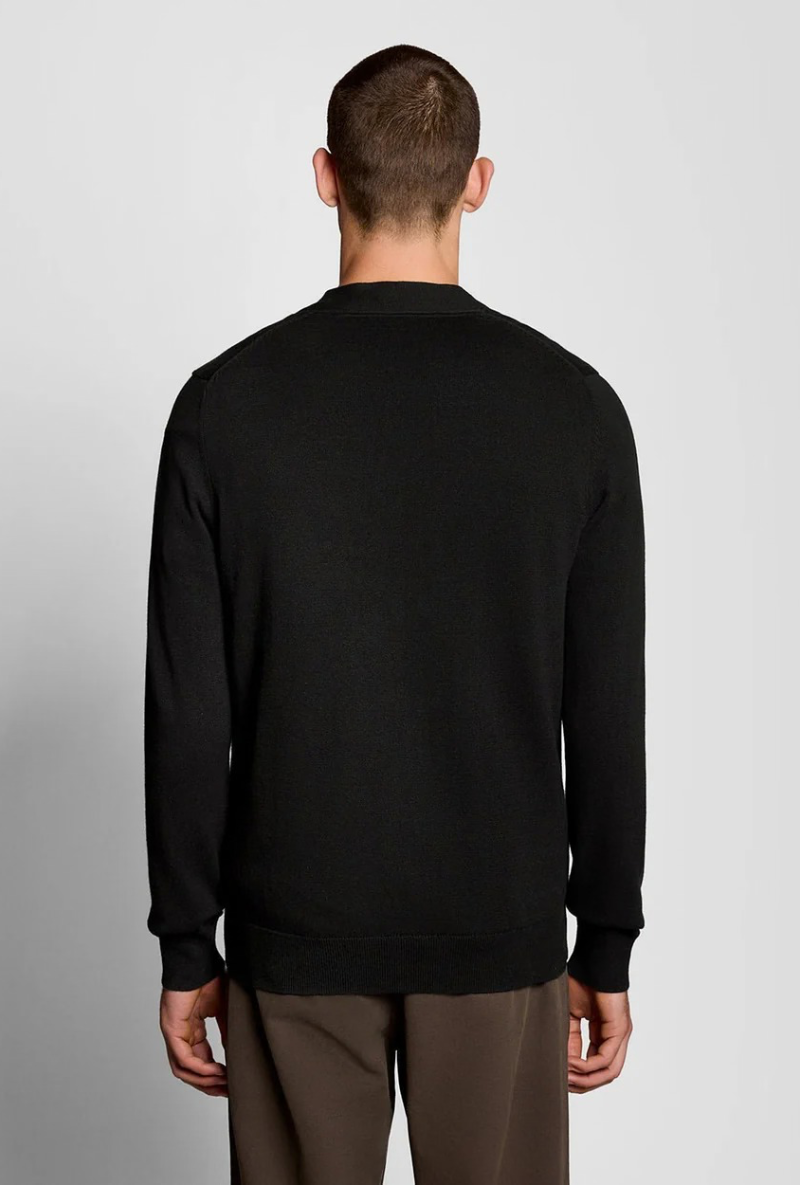 Back image of a model wearing Lyle and scott merino v neck cardigan in black, by brand Lyle and scott