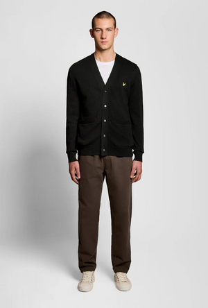 Front image of a model wearing the Lyle and scott merino v neck cardigan in black, by brand Lyle and scott