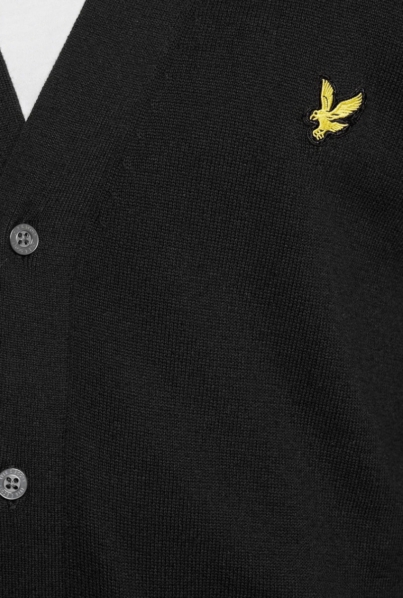 Front detail image of a model wearing Lyle and scott merino v neck cardigan in black, by brand Lyle and scott
