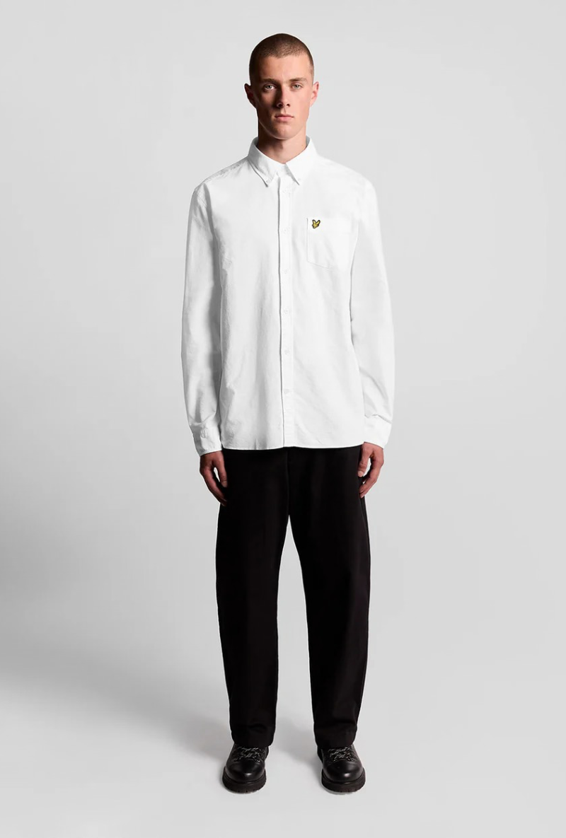 Front image of a model wearing Lyle and scott plain oxford shirt in white, by brand Lyle and scott