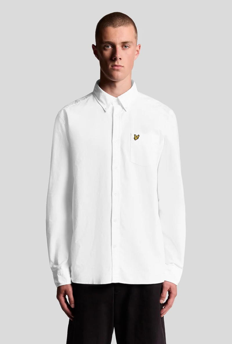 Front image of a model wearing Lyle and scott plain oxford shirt in white, by brand Lyle and scott