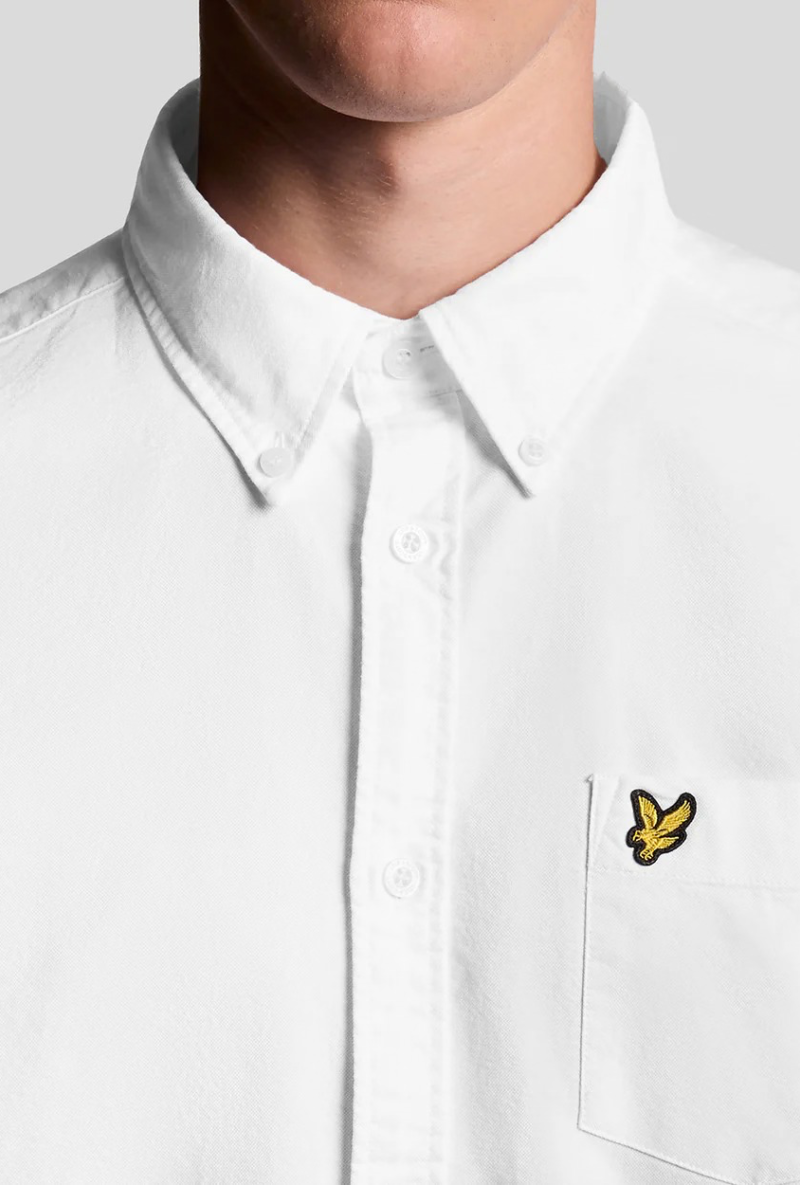 Front detail image of a model wearing Lyle and scott plain oxford shirt in white, by brand Lyle and scott