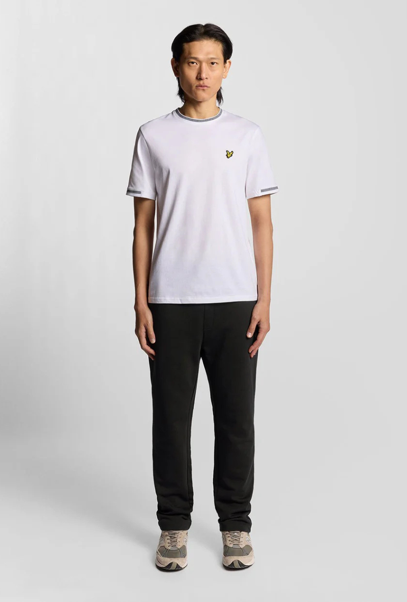 Front image of a model wearing Lyle and scott straight leg jogger in black, by brand Lyle and scott