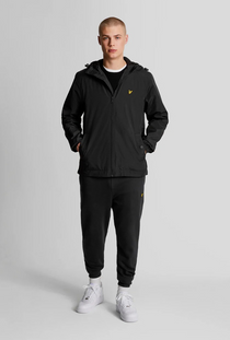 Front image of a model wearing the Lyle and scott zip through hooded jacket in black, by brand Lyle and scott