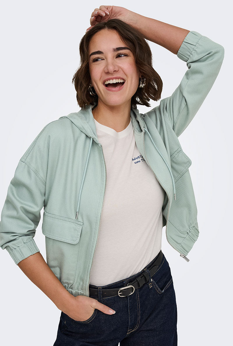 Front image of a model wearing Kenzie soft life jacket in light green, by brand Only