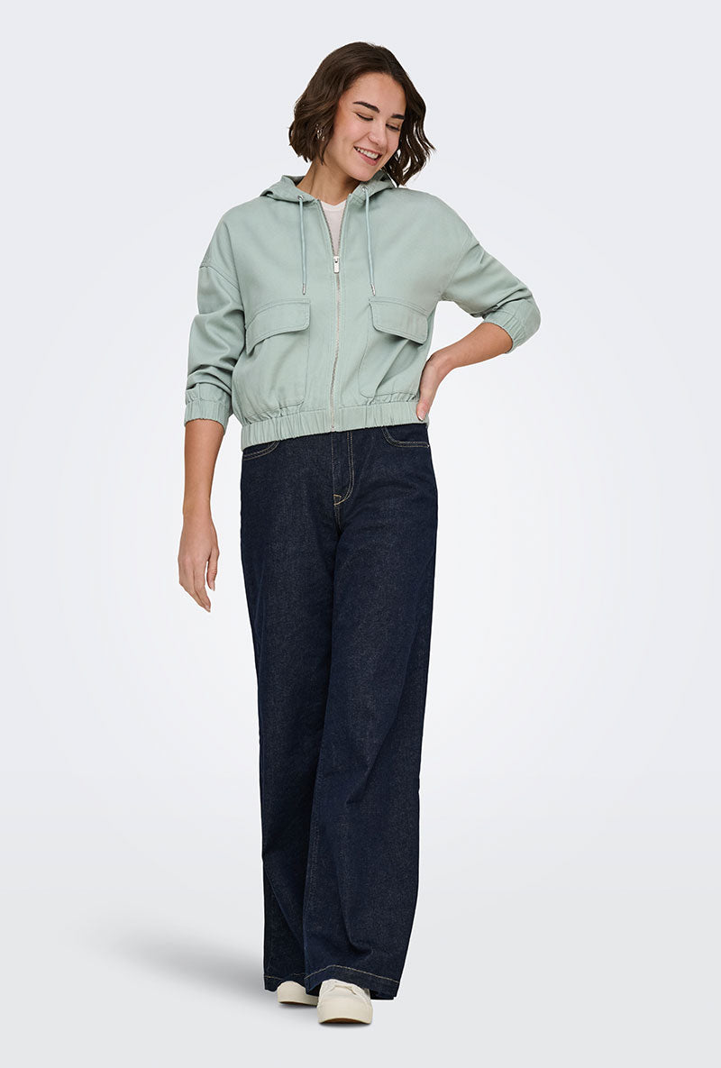 Front image of a model wearing Kenzie soft life jacket in light green, by brand Only