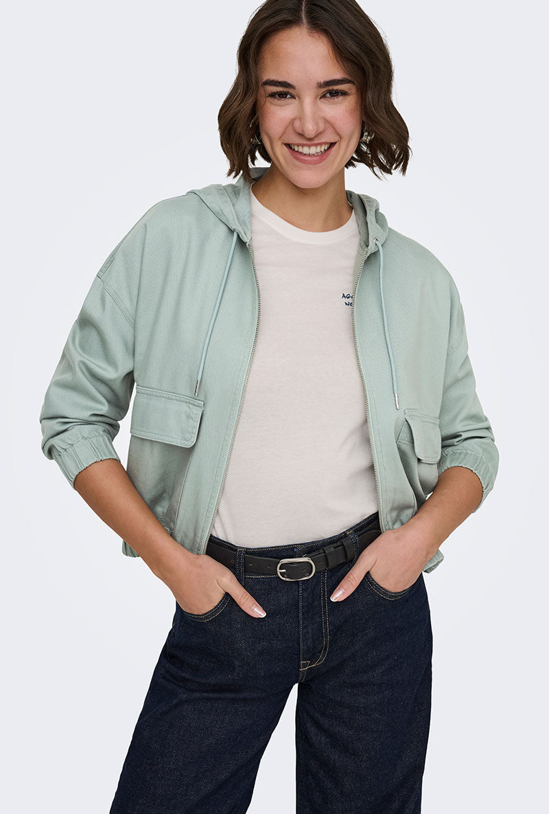 Front image of a model wearing Kenzie soft life jacket in light green, by brand Only