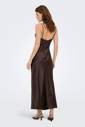 Back image of a model wearing the Losiris long strap dress in brown, by brand Only