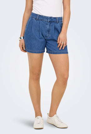 Front image of a model wearing Luka mw chino denim shorts in denim, by brand Only