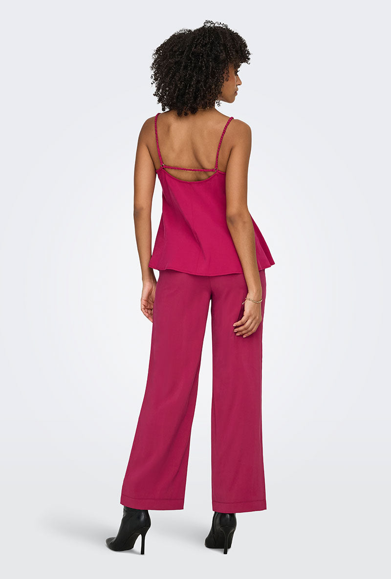Back image of a model wearing Madeli oaklyn strap top in fuschia, by brand Only
