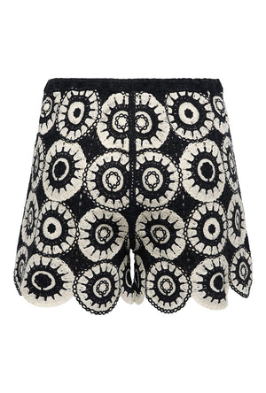 Back image of the Yvonne shorts in black, by brand Only