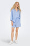 Front image of a model wearing the Augusta s/s shirt in light blue, by brand Only