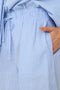 Pocket detail image of a model wearing the Augusta shorts in light blue, by brand Only