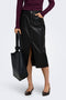 Front image of a model wearing Bitten faux leather pencil skirt in black, by brand Only