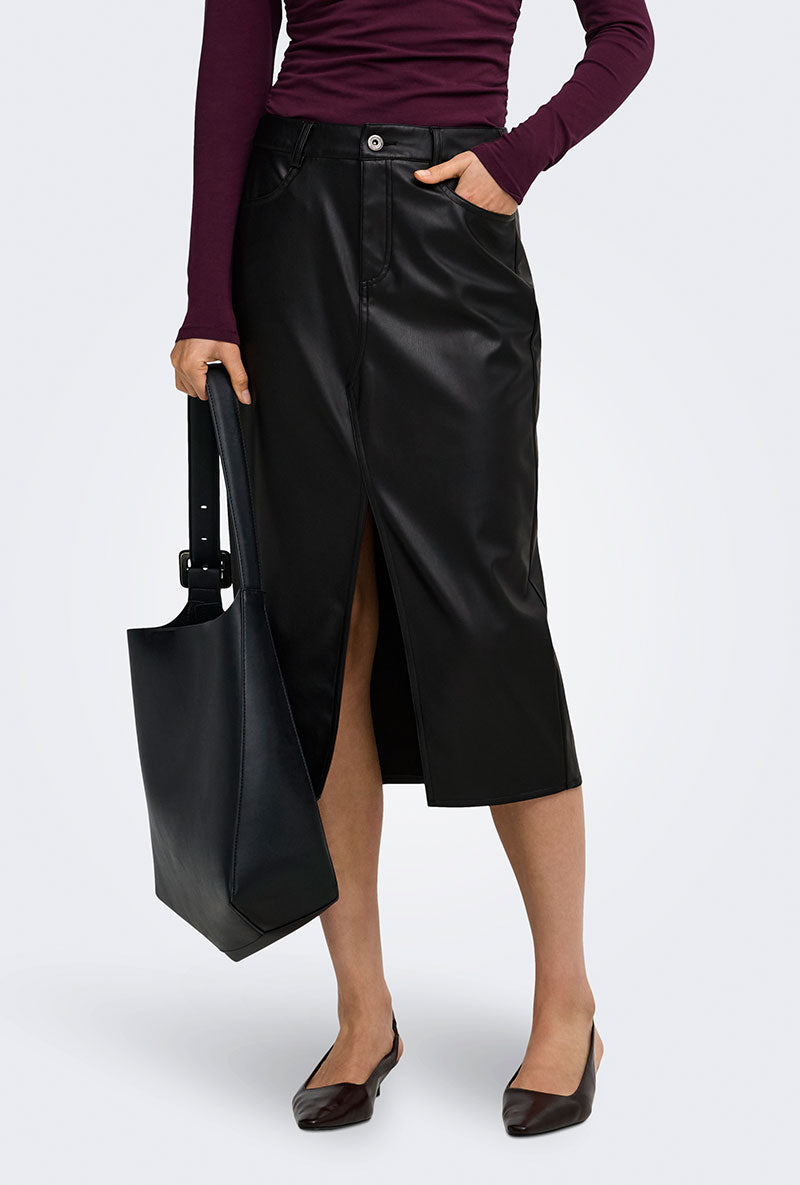 Front image of a model wearing Bitten faux leather pencil skirt in black, by brand Only