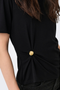 Detail image of a model wearing the Only elena s/s detail top in black, by brand Only