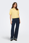 Front image of a model wearing Goa shortsleeve linen shirt in yellow, by brand Only