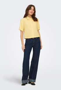 Front image of a model wearing the Goa shortsleeve linen shirt in yellow, by brand Only