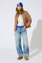 Front image of a model wearing the Gianna mw fold up jeans in denim, by brand Only