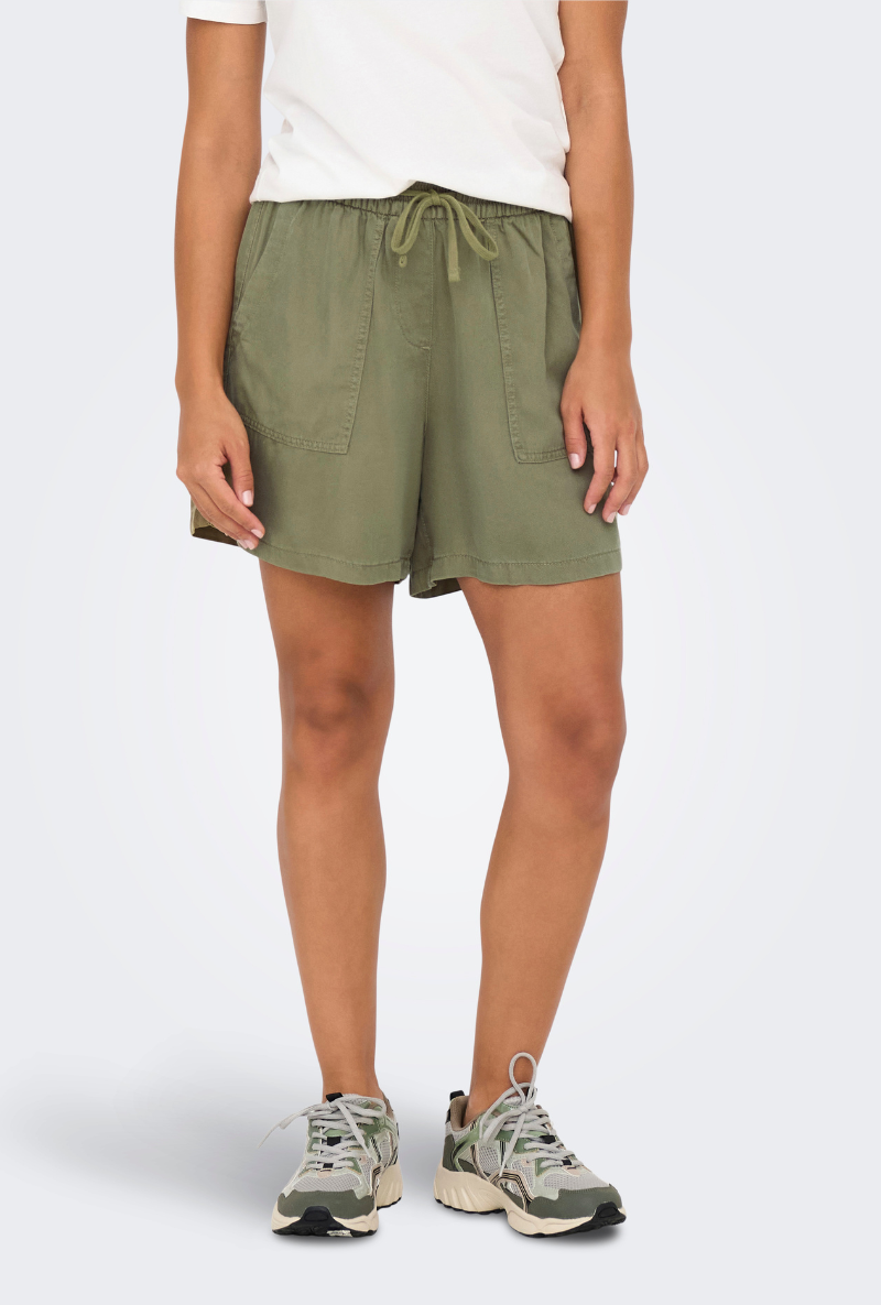 Front image of a model wearing Only kenya life hw shorts in khaki, by brand Jacqueline de yong