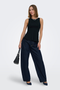 Front image of a model wearing Kiss sleeveless peplum top in black, by brand Only