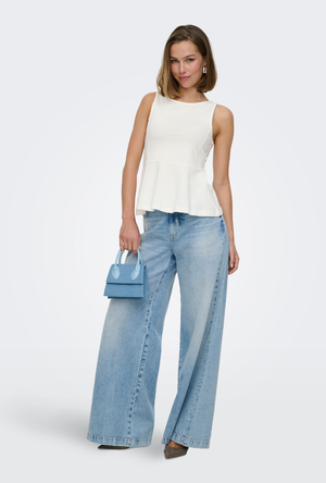 Front image of a model wearing the Kiss sleeveless peplum top in white, by brand Only