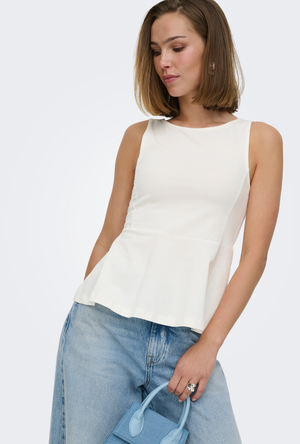 Front image of a model wearing the Kiss sleeveless peplum top in white, by brand Only