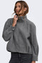 Front image of a model wearing the Lasta high collar bomber jacket in charcoal, by brand Only