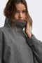 Front image of a model wearing the Lasta high collar bomber jacket in charcoal, by brand Only