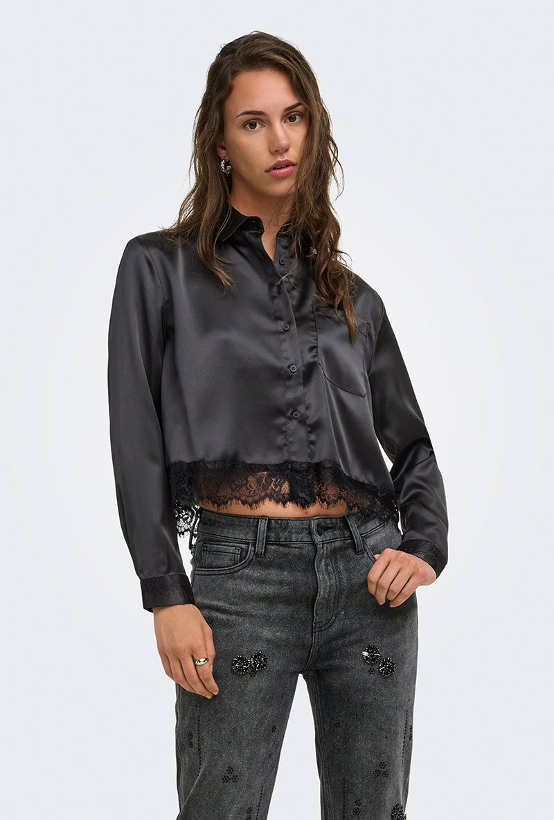 Front image of a model wearing Lindona l/s satin lace shirt in black, by brand Only