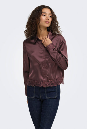 Front image of a model wearing the Lindona l/s satin lace shirt in chocolate, by brand Only