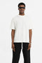 Front image of a model wearing Initial oversized t in off white, by brand Represent