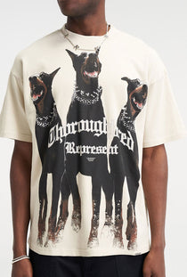 Front image of a model wearing the Thoroughbread t in off white, by brand Represent