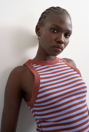Front image of a model wearing the Sanne rib racer vest in chocolate, by brand Top shop