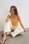 Front image of the Alfrida sleeveless vest in orange, by brand Top shop