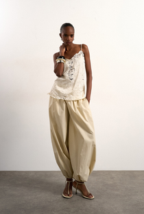 Front image of the Hallie sleeveless crinkle satin top in white, by brand Top shop